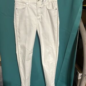 White denim jeans with one line of rhinestones down the side.